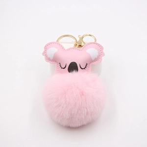 Pink faux fur koala pompom keychain with embroidered leather ears and golden metal clasp