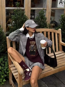 Fashionable grey plaid blazer suit with bear knitwear and matching shorts for women