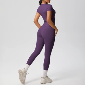 Detail view of purple yoga set featuring slim-fit short sleeve T-shirt and high waist leggings
