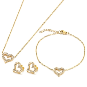 Three-piece gold titanium steel jewelry set featuring micro-pave heart pendants