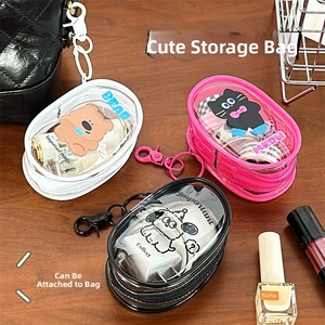 Detailed view of portable transparent cartoon PVC mini storage pouches with cute animal prints