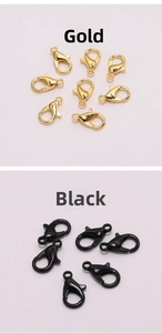 Close-up of gold and black alloy lobster clasps for DIY jewelry and necklace making