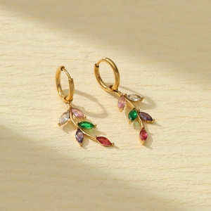 Titanium steel leaf earrings with colorful zircon stones on a minimalist background