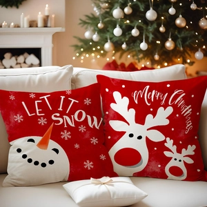 Detail of red Christmas pillowcase set with Let It Snow print on a cozy sofa