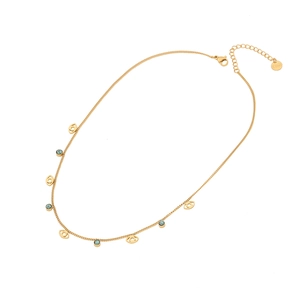 Golden stainless steel necklace with evil eye charms and turquoise beads on white background