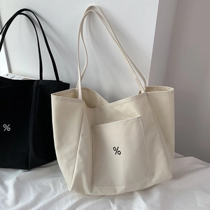 Minimalist large canvas tote bag in black and off-white with percentage symbol print