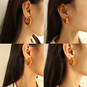 British style retro geometric C-shaped gold hoop earrings with textured hollow design