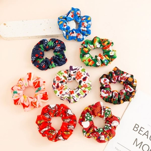 Set of 8 Christmas scrunchies featuring Santa, snowmen, and festive holiday patterns