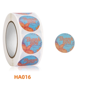 Close-up of circular blue floral stickers featuring Thank You Very Much message for sealing