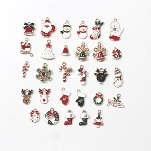 Collection of 23 DIY Christmas alloy charms featuring Santa, tree, reindeer on white background
