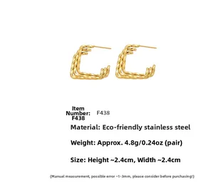 Detail view of 18k gold plated stainless steel earrings with triple square twist design