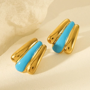Detail of 18k gold plated stainless steel earrings with vibrant turquoise enamel inlay