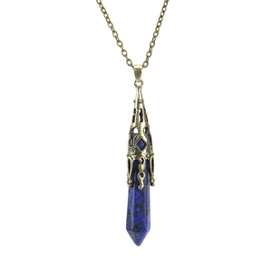 Detailed view of Lapis Lazuli hexagonal pendant with bronze filigree cap and chain