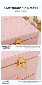 Detail of pink quilted leather texture and gold heart-shaped lock on jewelry box