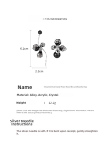 Detailed view of asymmetric earrings featuring black beads, crystal and silver needles
