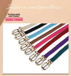 Detailed view of woven skinny belts in eight colors featuring stylish golden buckles