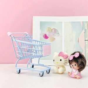 Miniature pink and blue metal wire shopping basket for desktop organization