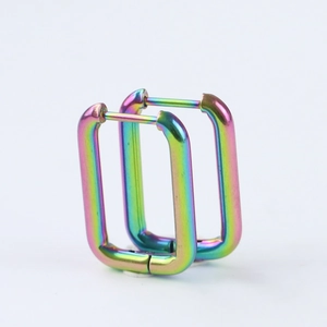Detail of 10mm U-shaped stainless steel earrings with vibrant rainbow iridescent finish