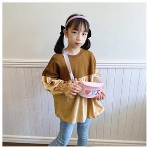 Pink sequin LOVE letter kids fanny pack shown on a young girl in a stylish outfit