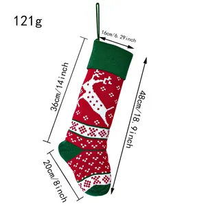 Detailed size chart for red knitted Christmas stocking with reindeer embroidery