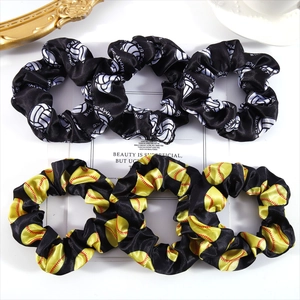 Satin scrunchies with volleyball and softball prints in black, volleyball and softball patterns