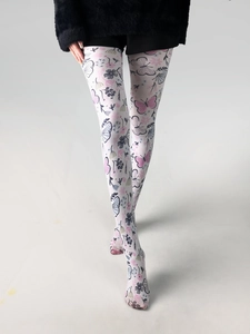 Detail shot of white patterned tights featuring vintage pink and blue butterfly motifs