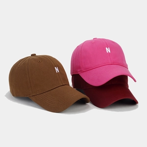 Cotton baseball caps with N letter embroidery in brown, pink and deep red colors