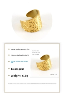 Detail of 18K gold-plated stainless steel wide open ring with hammered texture finish