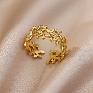 Detail of adjustable 18k gold plated stainless steel ring with olive leaf design