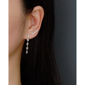 Elegant S925 sterling silver bar stud and sequin tassel earrings on model