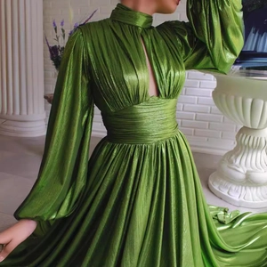 Elegant avocado green halter pleated gown with metallic shimmer and waist cinching design