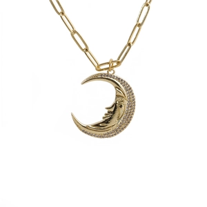 Gold moon face pendant necklace with cubic zirconia and paperclip chain style