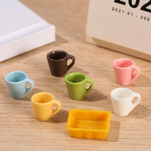Miniature resin set with six colorful mugs on a yellow tray for DIY dollhouse decor