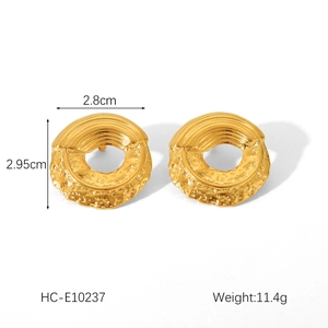 Detailed view of 18K gold plated stainless steel stud earrings with hammered texture