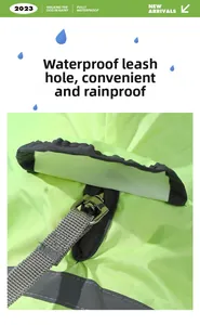 Detail of waterproof dog raincoat with reinforced leash hole and fluorescent nylon fabric