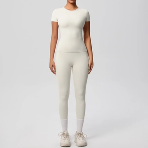 Front view of creamy white two-piece high-elastic compression yoga set with short sleeves