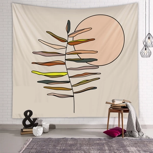 Detail view of abstract botanical tapestry with sun and leaves on white brick wall background