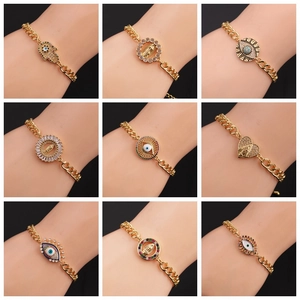 Detailed grid of adjustable gold bracelets with zircon charms like Hamsa and Evil Eye