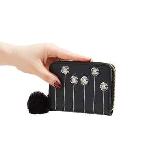 Mini black plush purse with white daisy embroidery and black pompom keychain