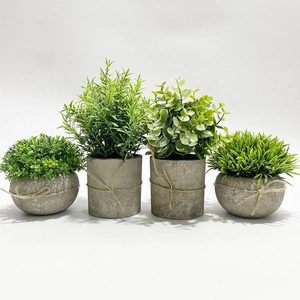 Set of four artificial eucalyptus plants in grey cement pots with jute rope decoration