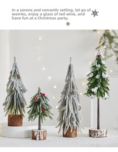 Close-up of four mini snowy Christmas trees with pine cones and natural wooden bases