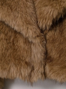 Close-up of thick brown faux fur texture showing premium plush fibers and soft shine