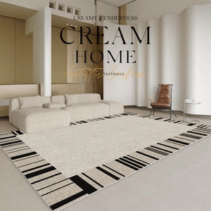 Detail of waterproof PVC kitchen mat with cream geometric borders and non-slip texture