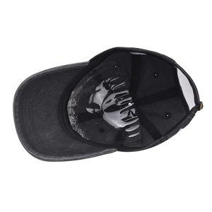 Detailed interior of vintage washed cotton baseball cap with white care label