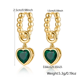 Macro shot of S925 sterling silver stamp on vintage heart earring with emerald green zircon