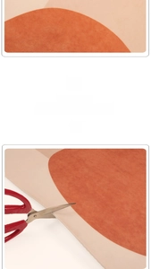 Detail of cuttable waterproof leather mat with orange geometric patterns for home