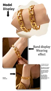 Macro detail of gold-plated geometric rectangle link chain bracelet on model's wrist