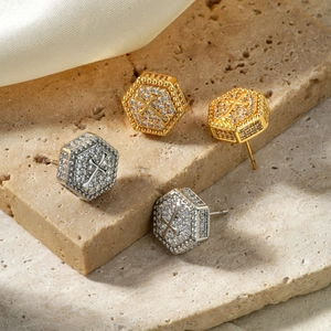 Hexagon stud earrings with cross design and sparkling cubic zirconia in gold and silver