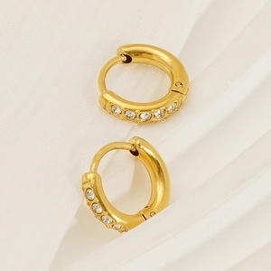 Fashion 18K gold plated hoop earrings with crystals on elegant white silk background