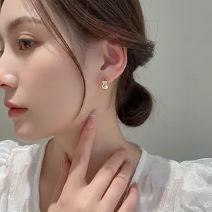Minimalist gold plated capsule stud earrings with high polish finish for women